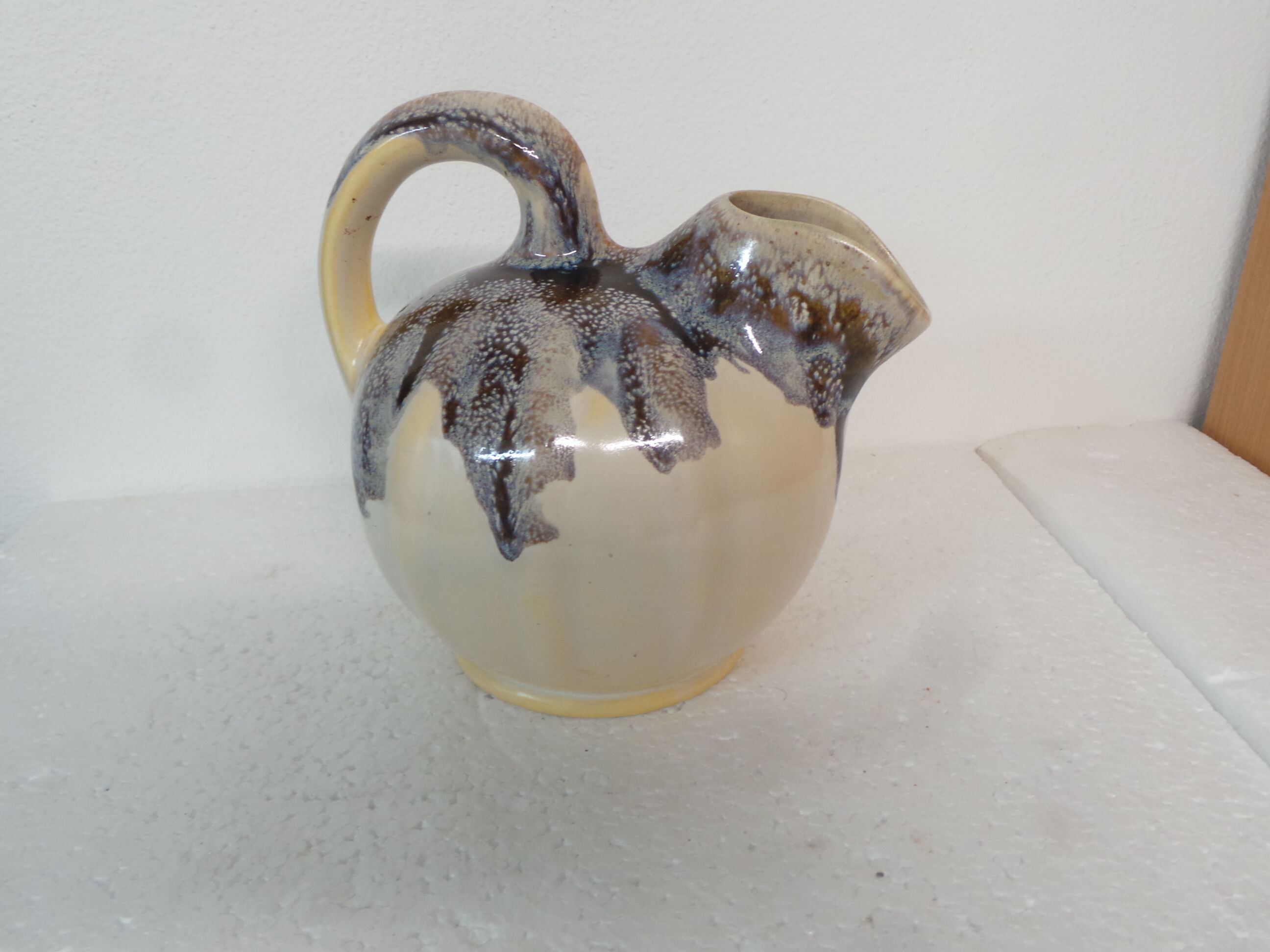 Blue brown brown varnished pitcher