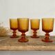 8 mismatched vintage amber glasses