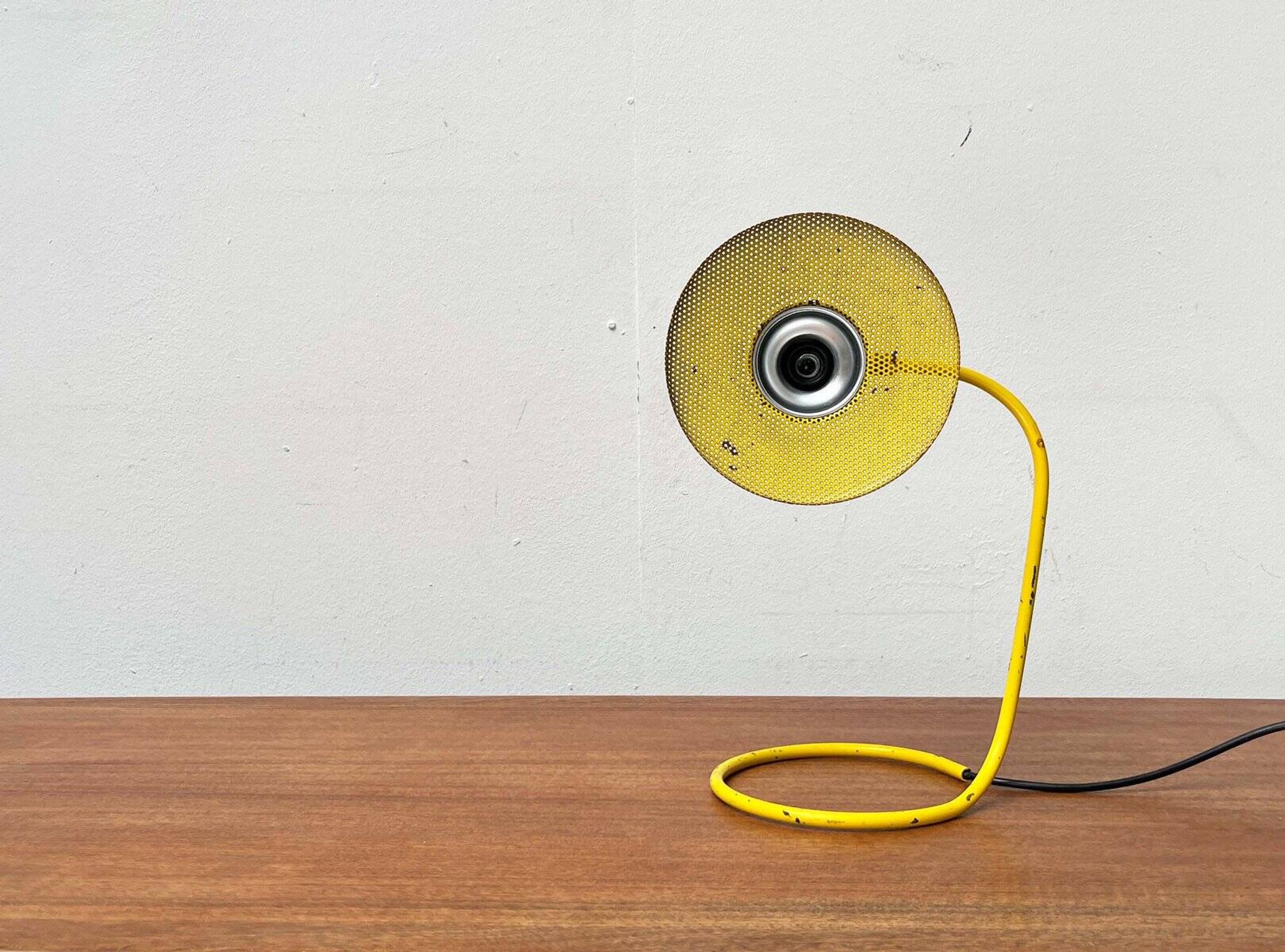 Perforated metal table lamp in Mid-Century Modern style, in the style of Mathieu Matégot, 1960s.