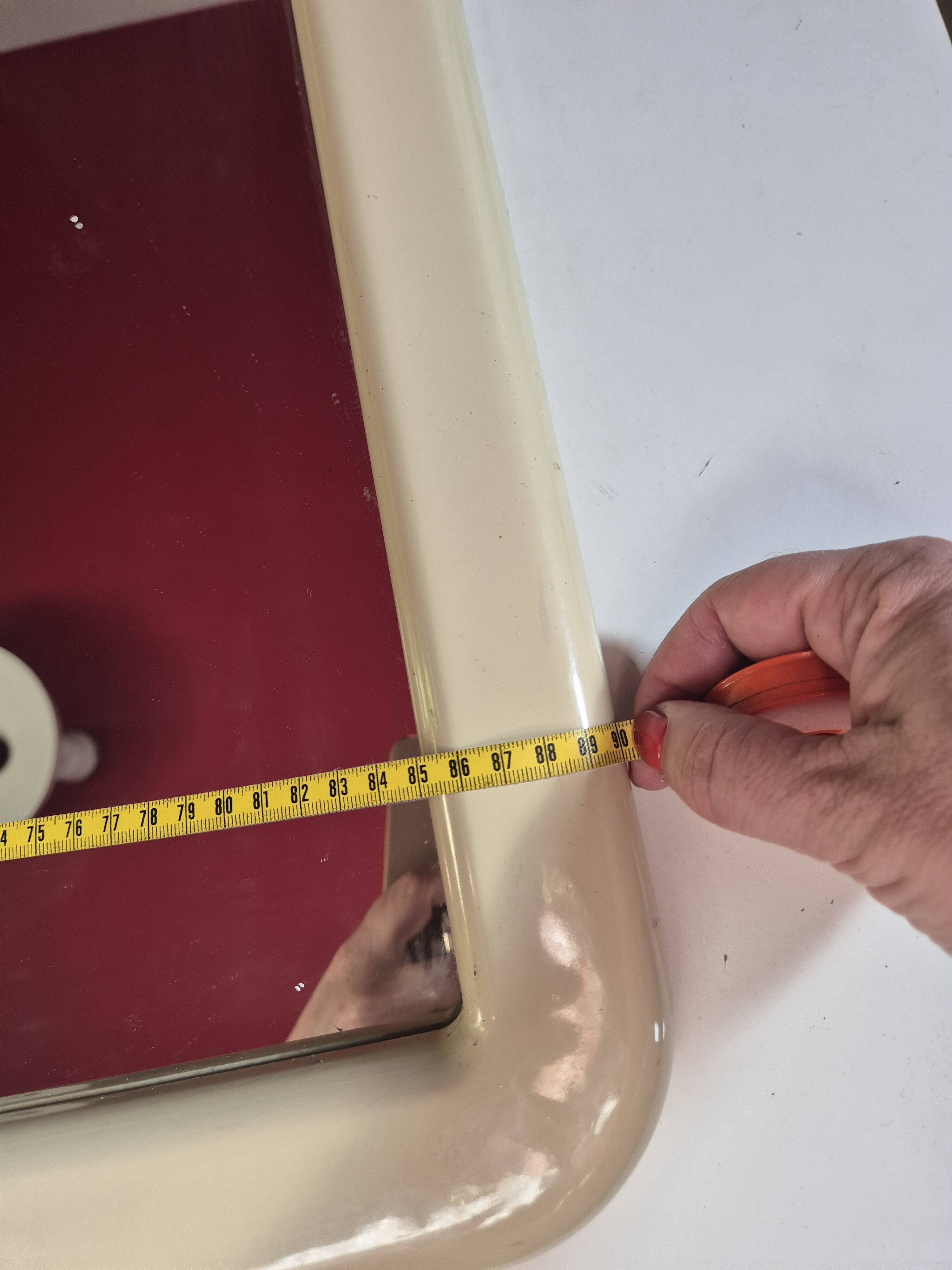 vintage mirror from the 70s with a large beige border, 90 by 60 cm