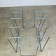 Postmodern magazine rack in grey metal, 1980s.