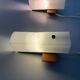 Mid-century wall lights in white plexiglass with a wooden base, 1960s, Germany.