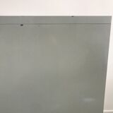 Three-drawer industrial grey metal filing cabinet with hanging backs