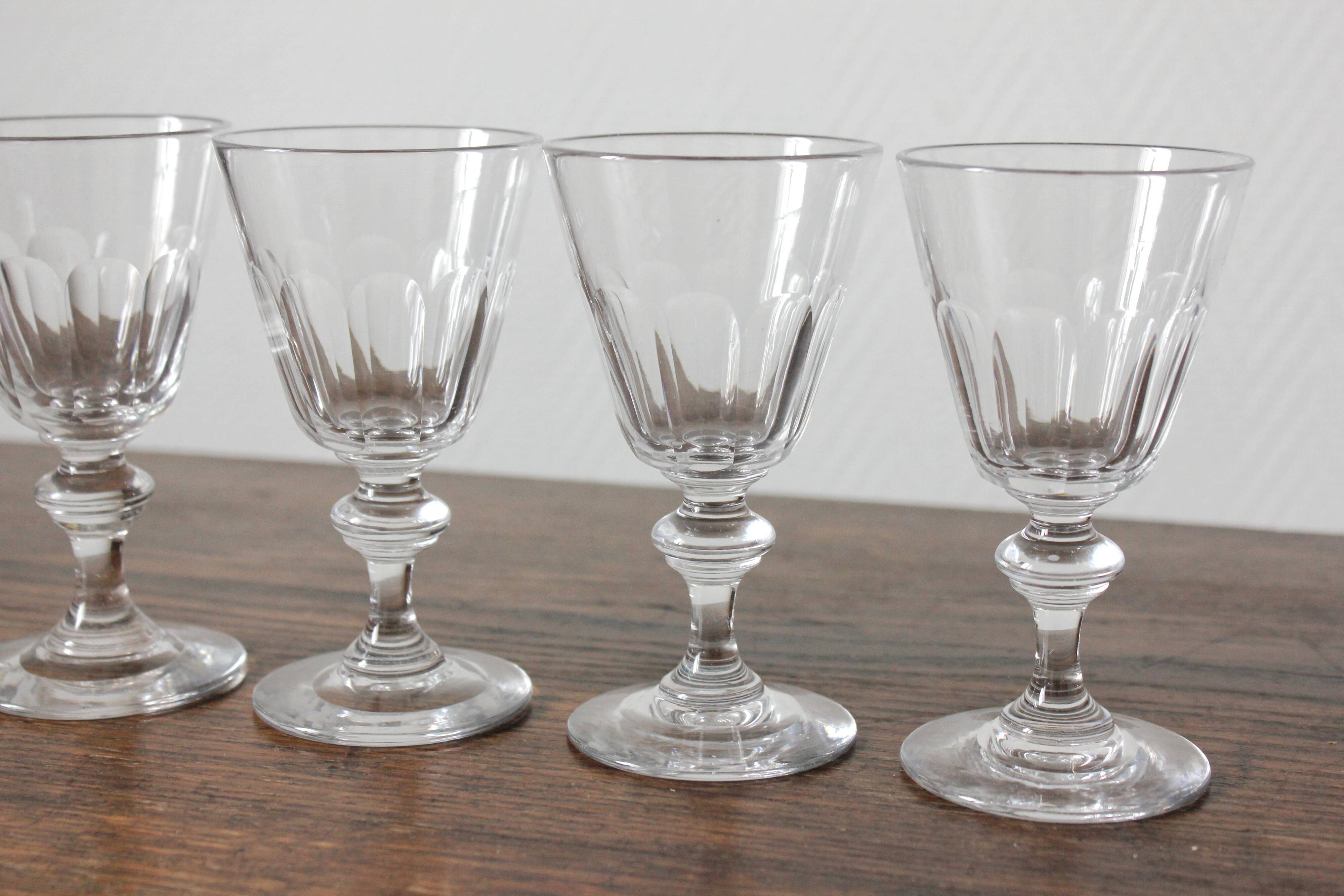 4 glasses with white wine in crystal ringing the nineteenth