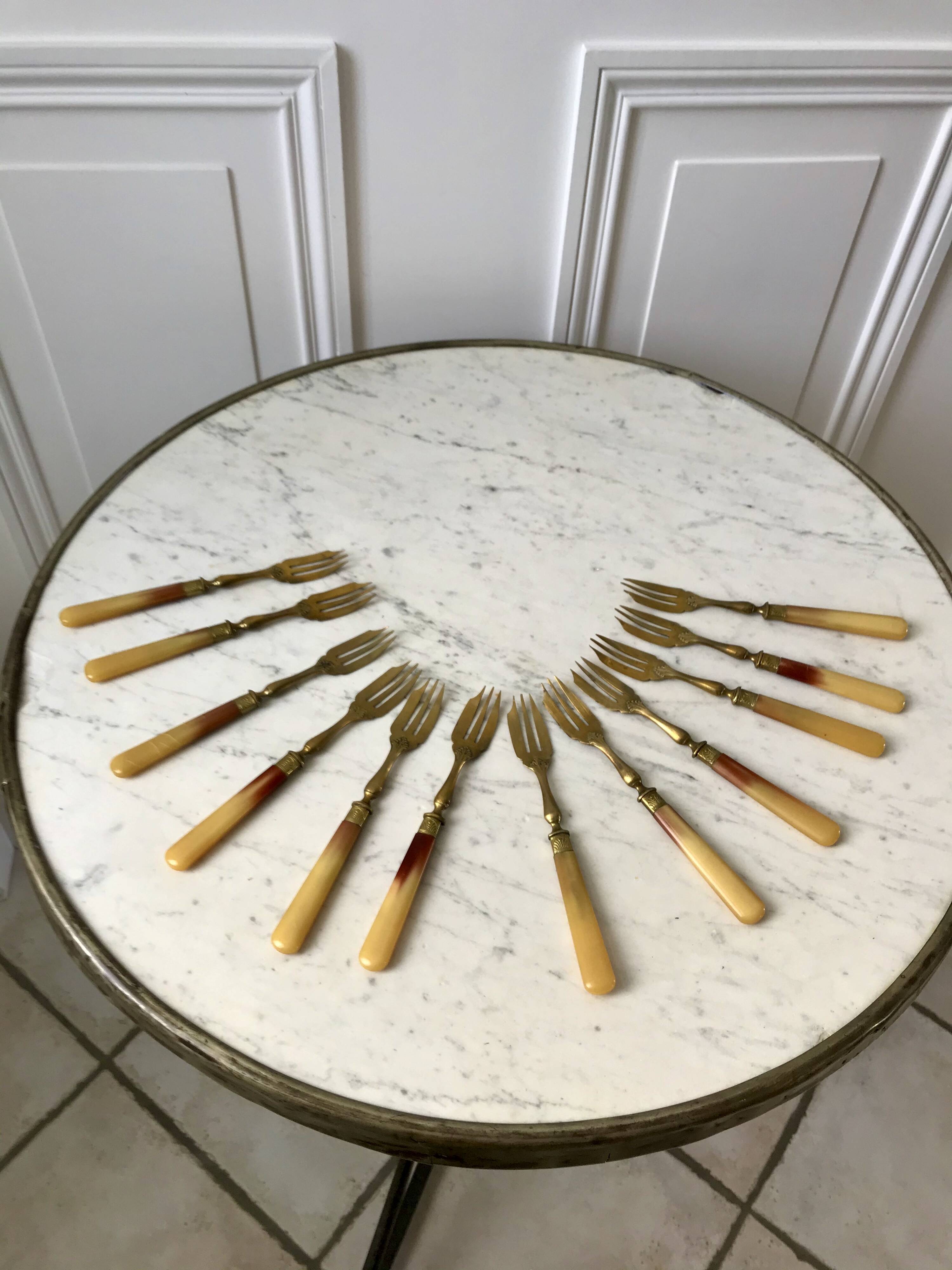 set of 12 horn dessert forks from the 50s