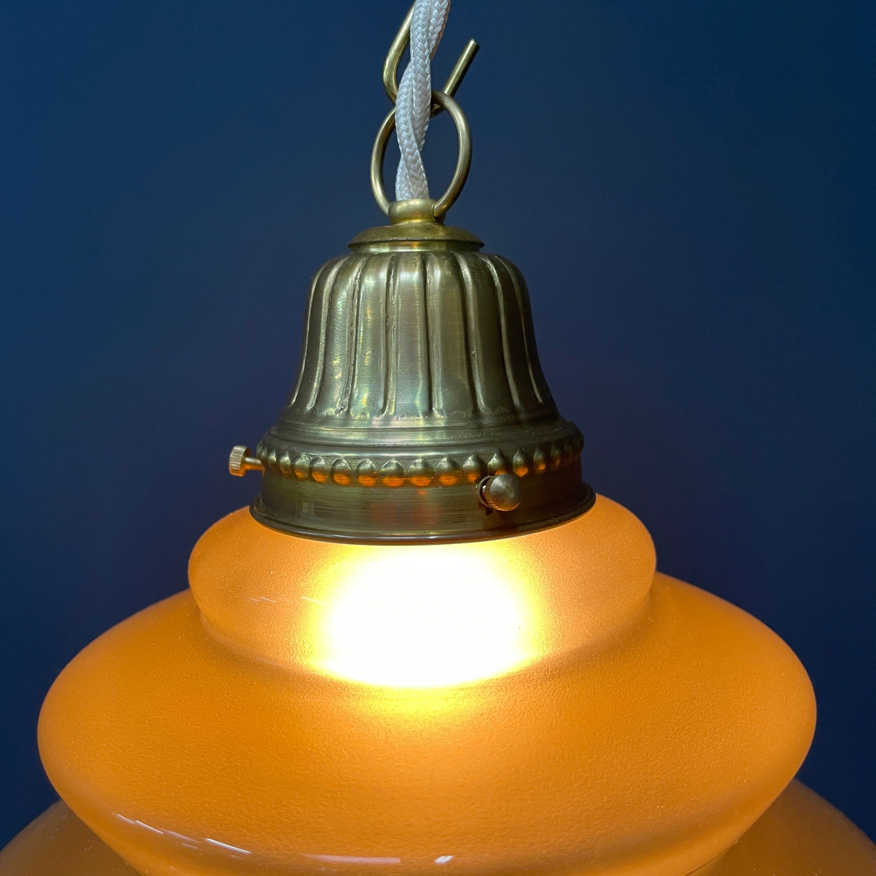 Vintage ocher glass hanging lamps with brass gallery