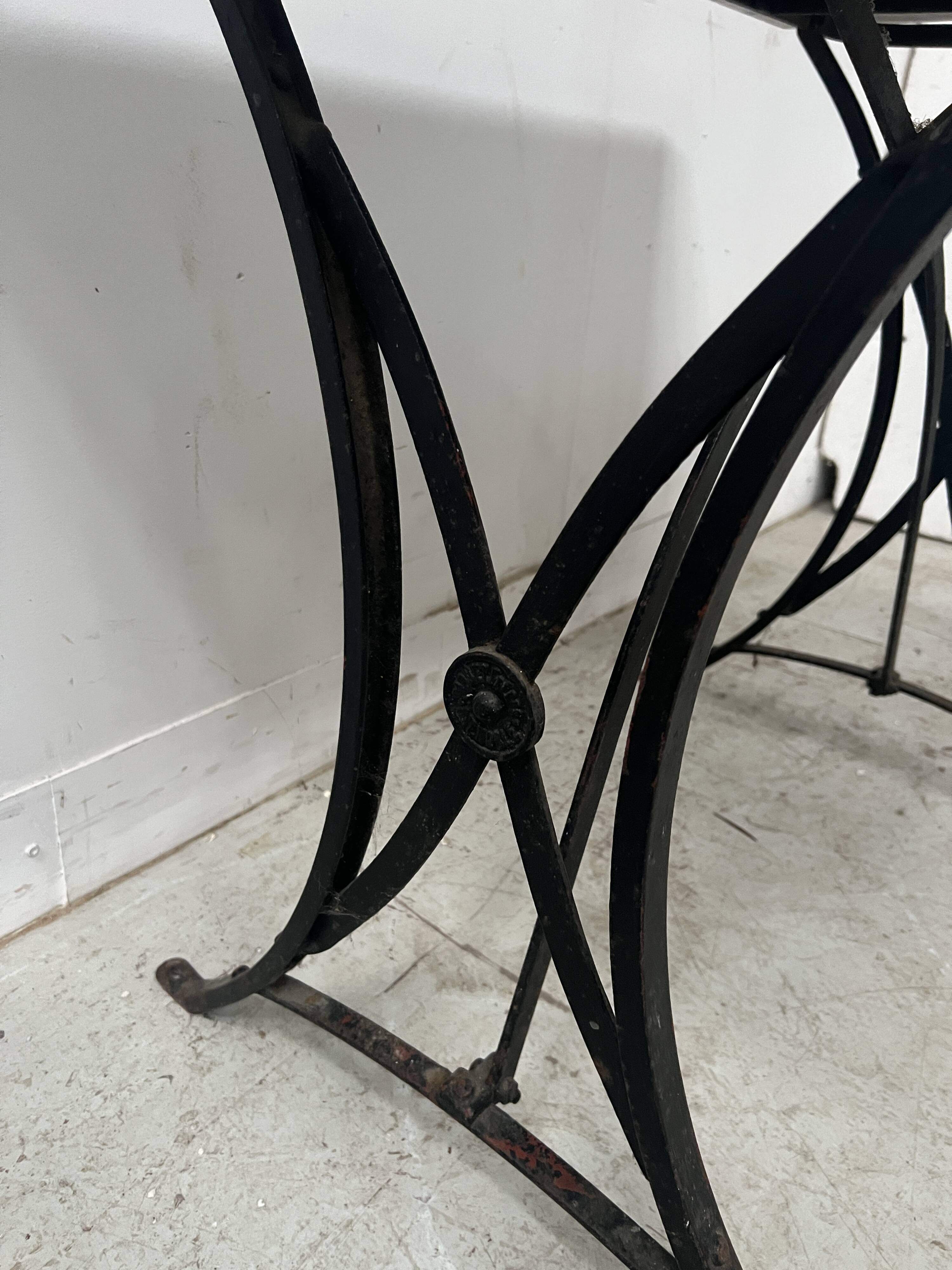 Garden table or veranda in cast iron from the 20th century.