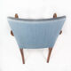 Armchair in mahogany and upholstered with light blue fabric by Fritz Hansen