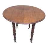 Round table with shutters with extension