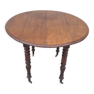 Round table with shutters with extension