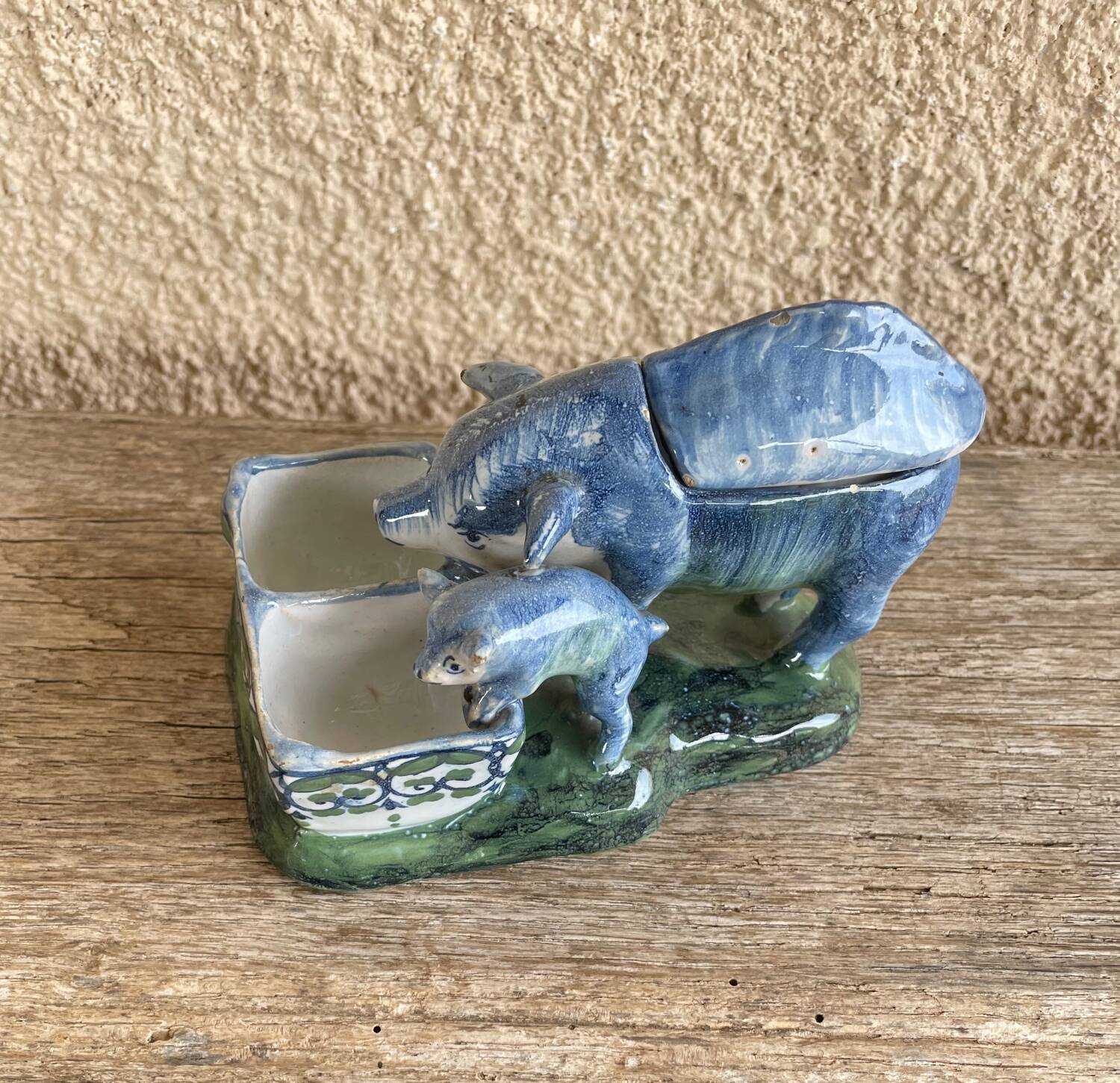 Salt cellar and mustard pot in French faience by A Clement.