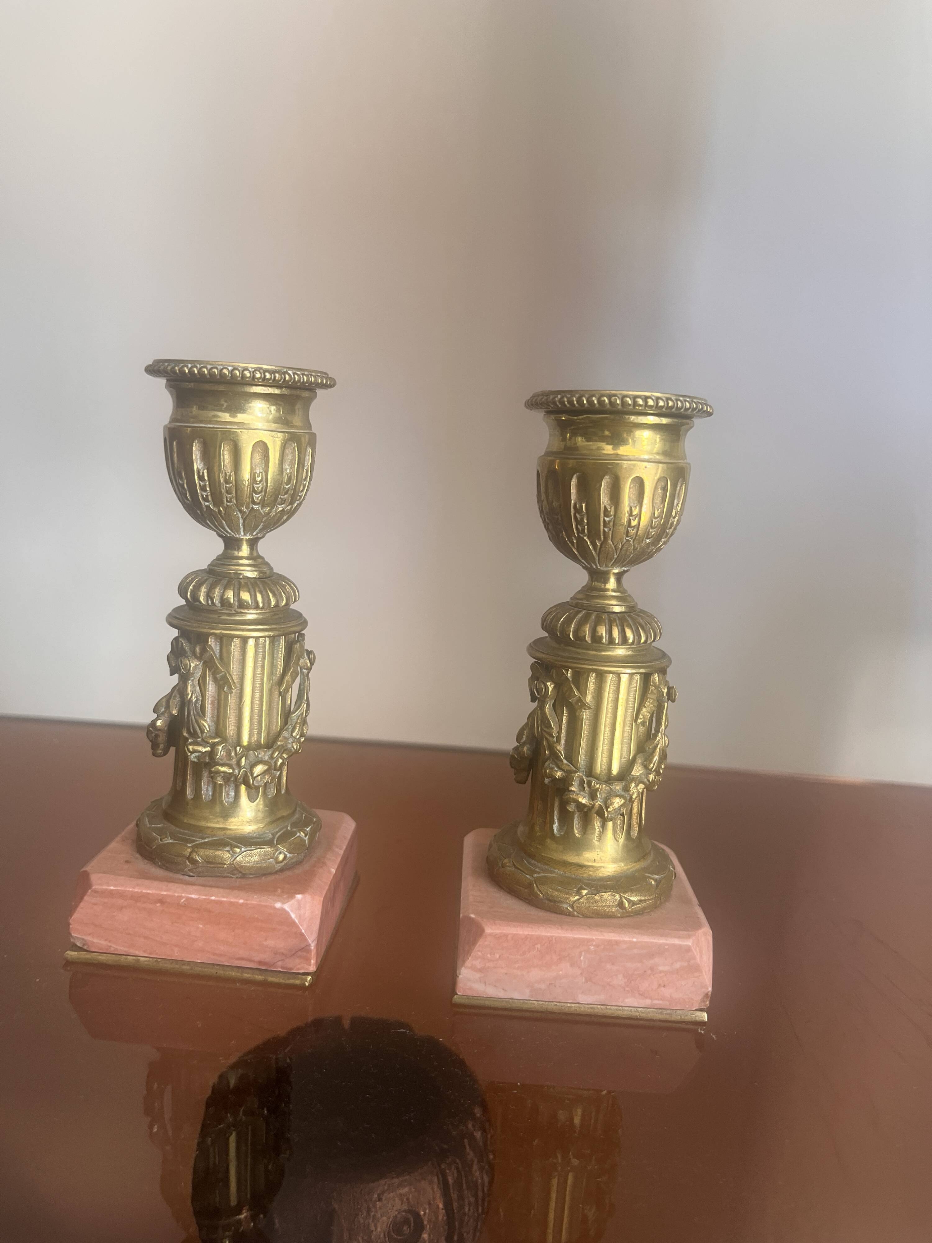 pair of antique bronze candlesticks