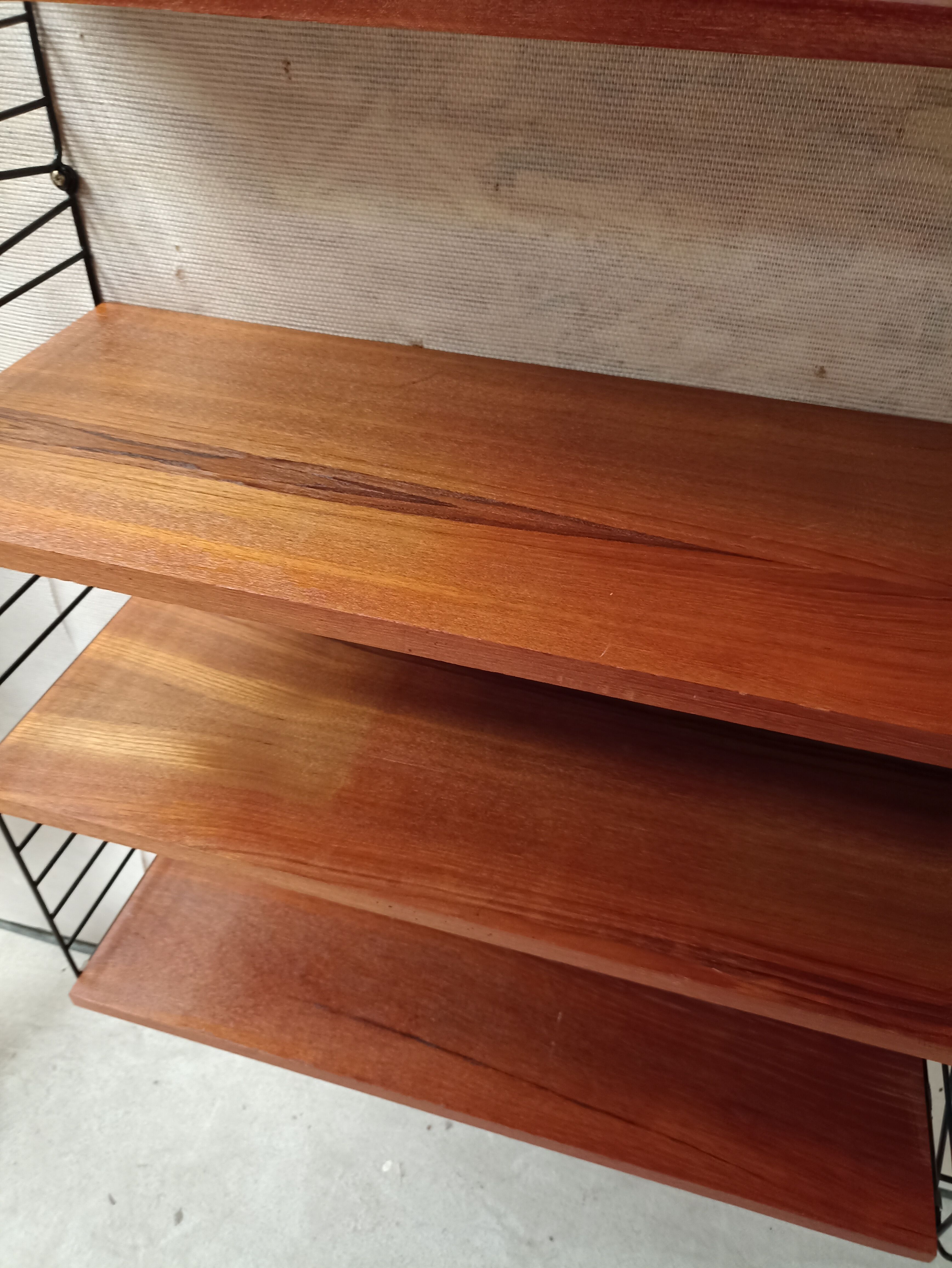 Wall bookcase string