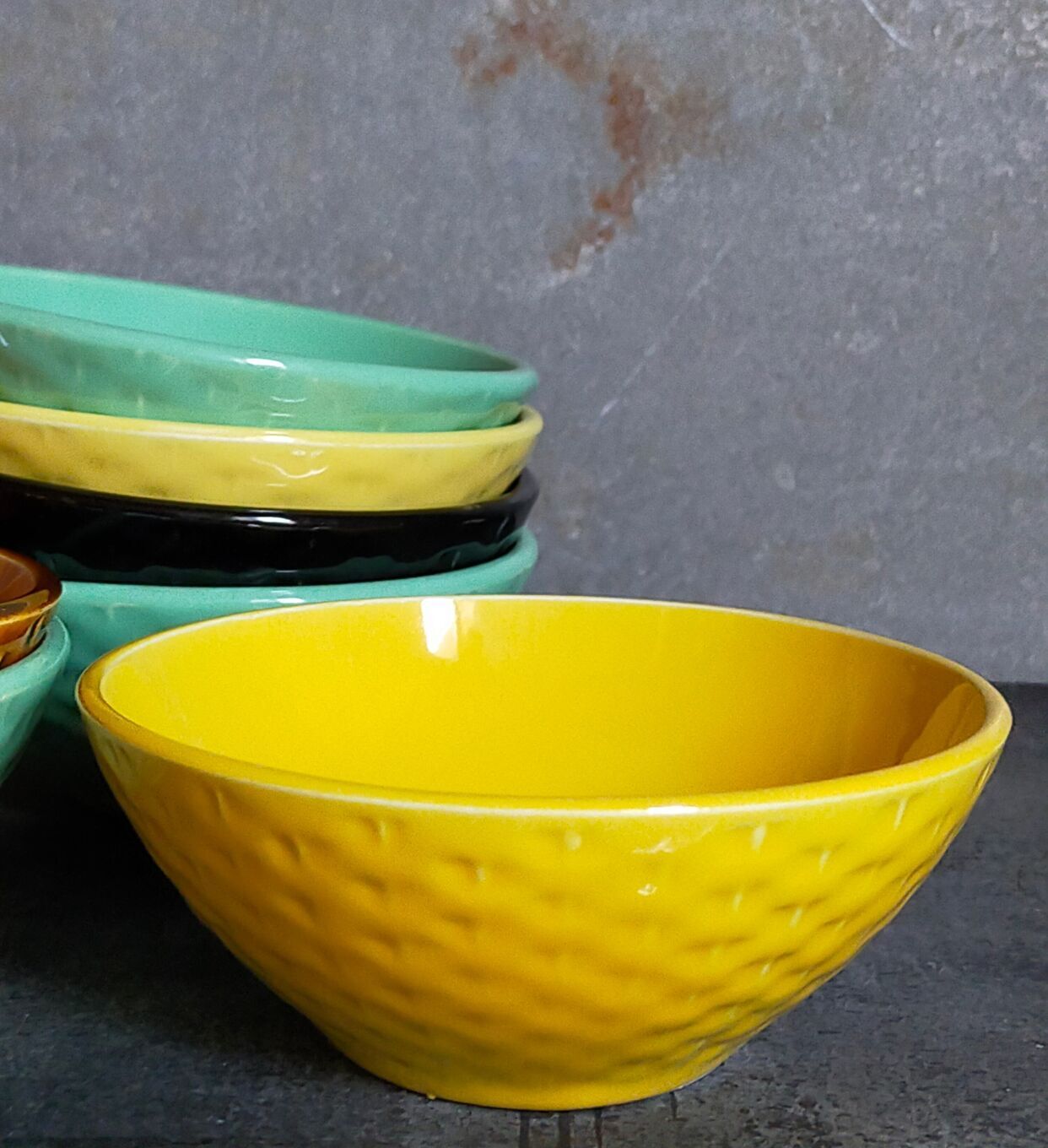 Seven vintage slip ceramic bowls