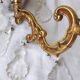 pair of bronze wall lights with pendants
