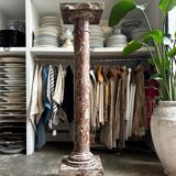 Red marble column