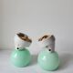 Duo of wall lamps in porcelain and green opaline