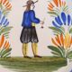 Assiette en faience hr quimper décor de breton