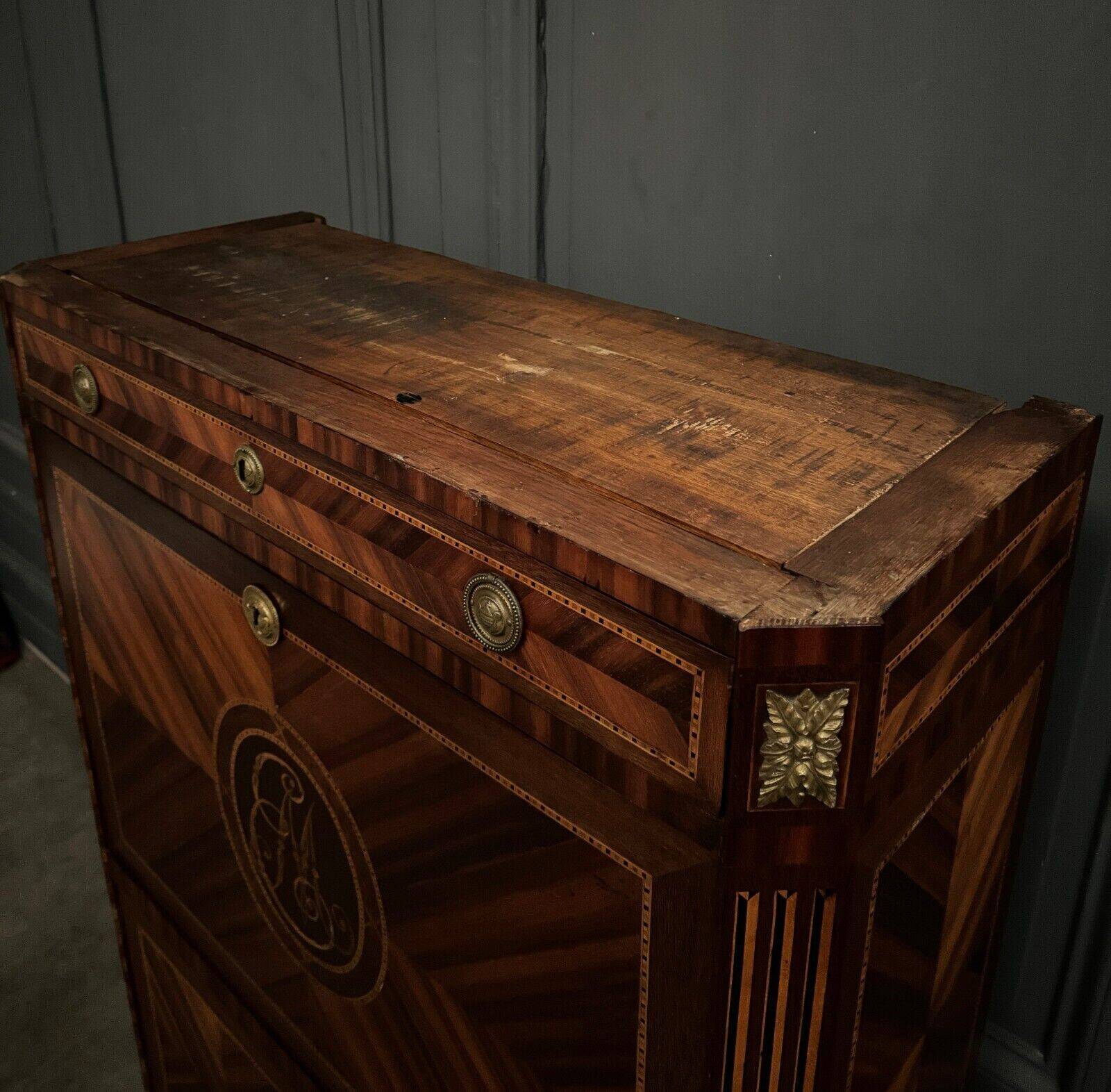 Louis XVI period secretary in monogram marquetry and white marble