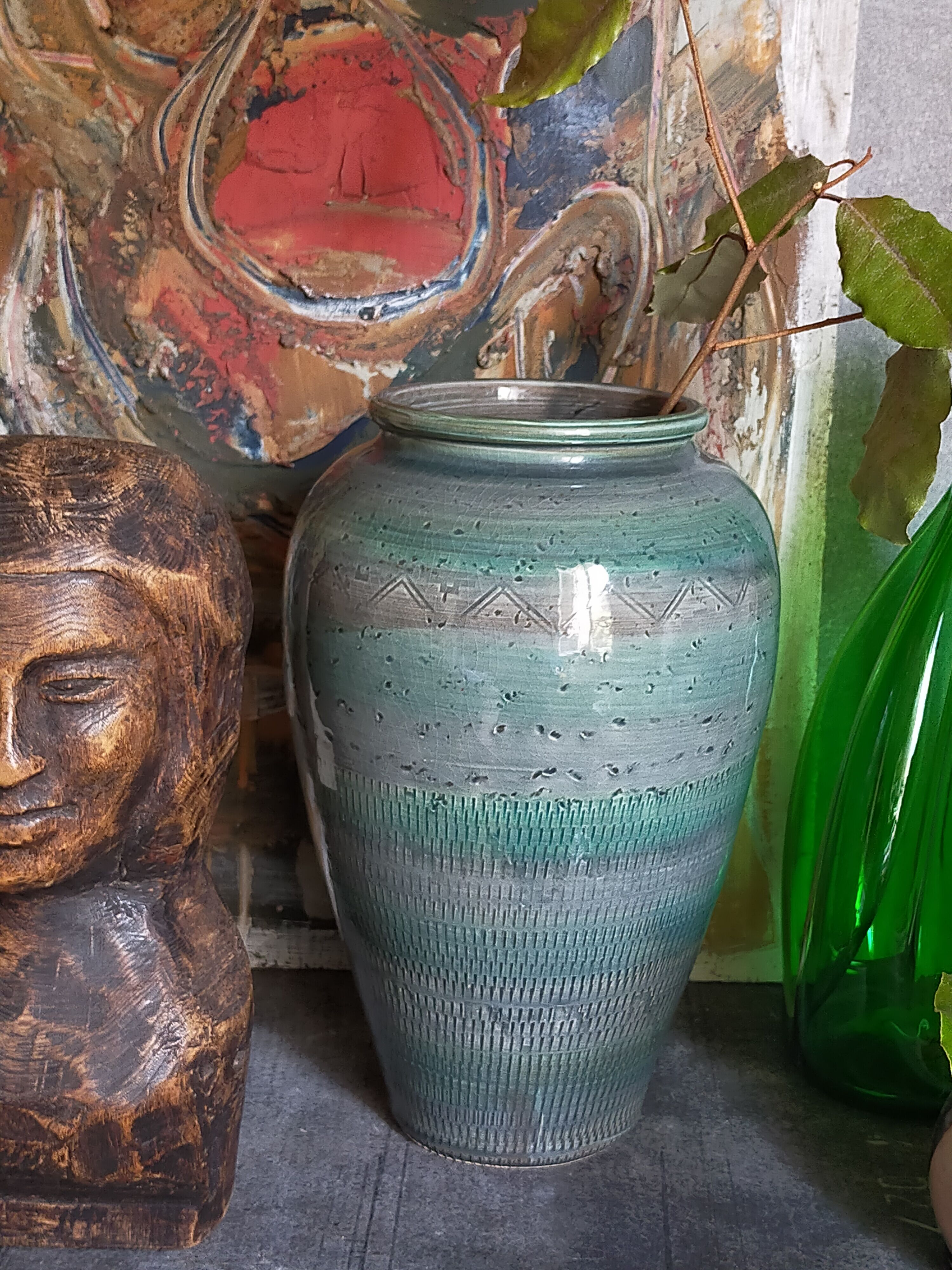 Oblong ceramic vase sacrificed with blue enamel