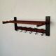 Wall-mounted coat rack