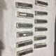 Lot of 12 silver metal knive holders