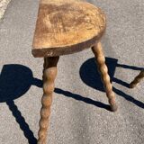 Pair of tripod farm stools in turned wood
