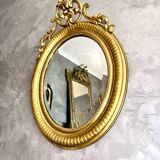Antique oval mirror from the 20th century