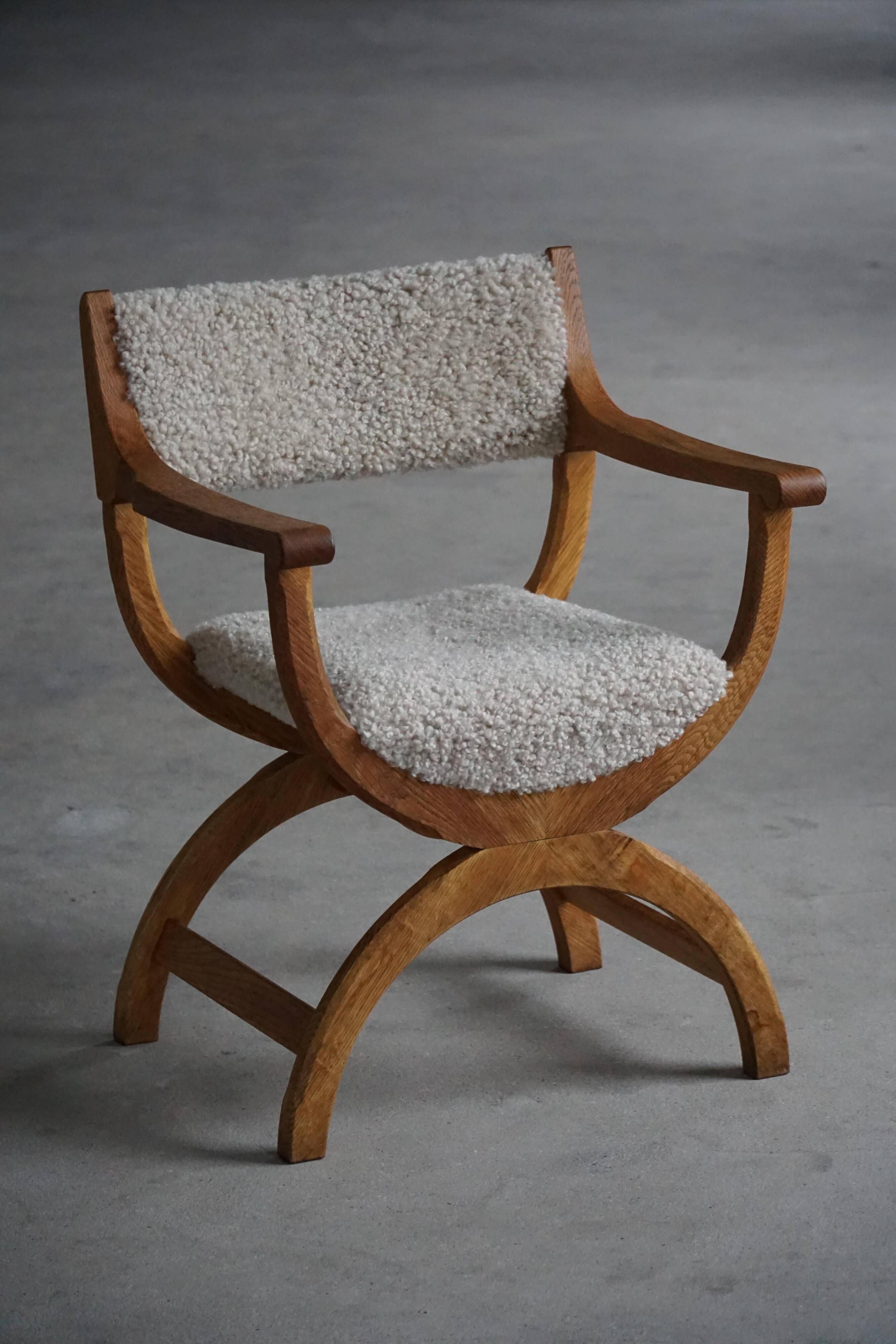 Henning Kjærnulf, Oak and lambswool armchair, "Kurul" model, Mid-century, 1960s