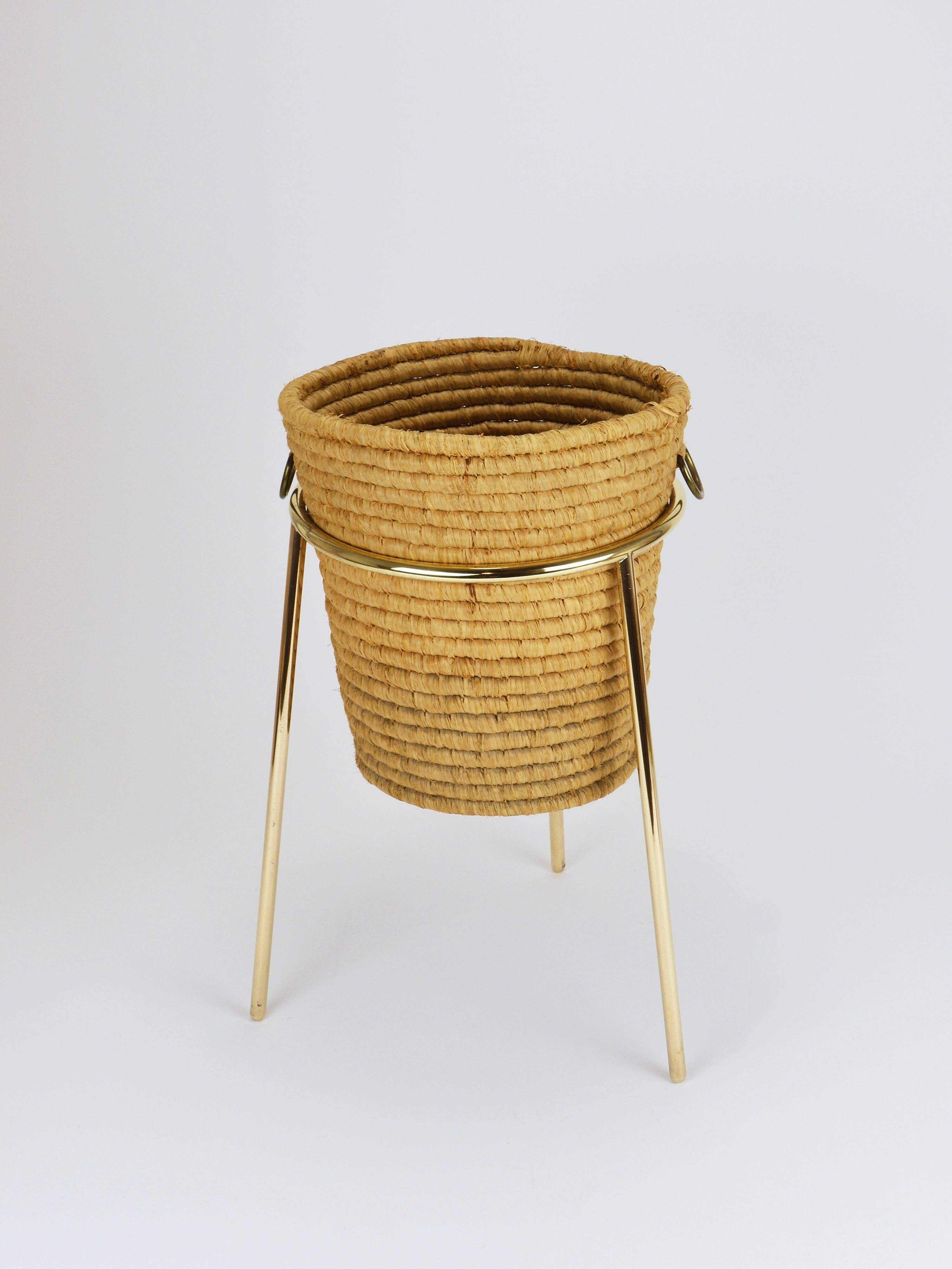 Carl Auböck II paper basket in raffia and brass, umbrella stand, 1950s