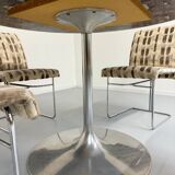 Old marble dining table with metal tulip base from the Italian design in the 60s