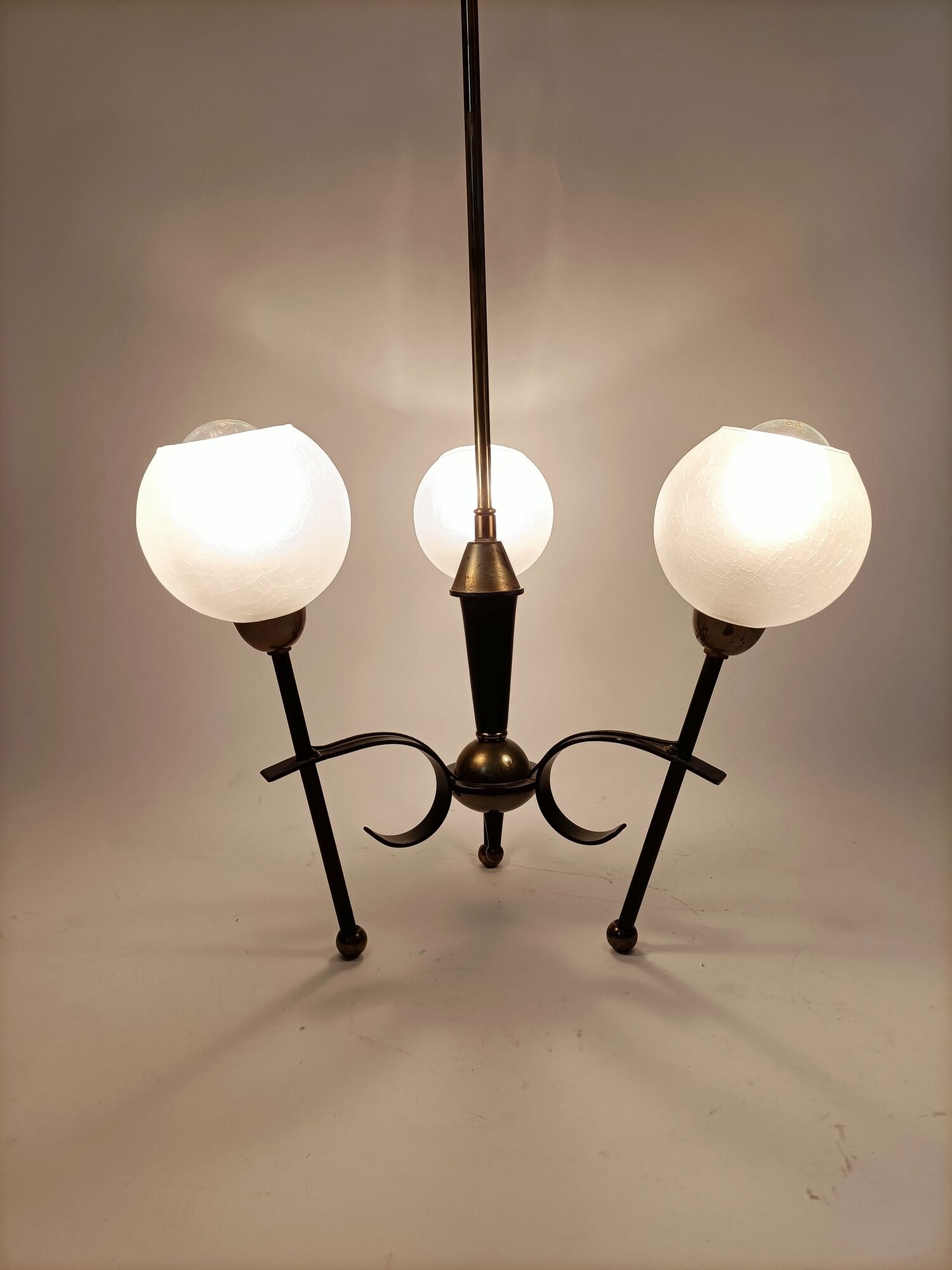 Black and gold lace-up with three arms of vintage 1950 lights