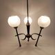 Black and gold lace-up with three arms of vintage 1950 lights