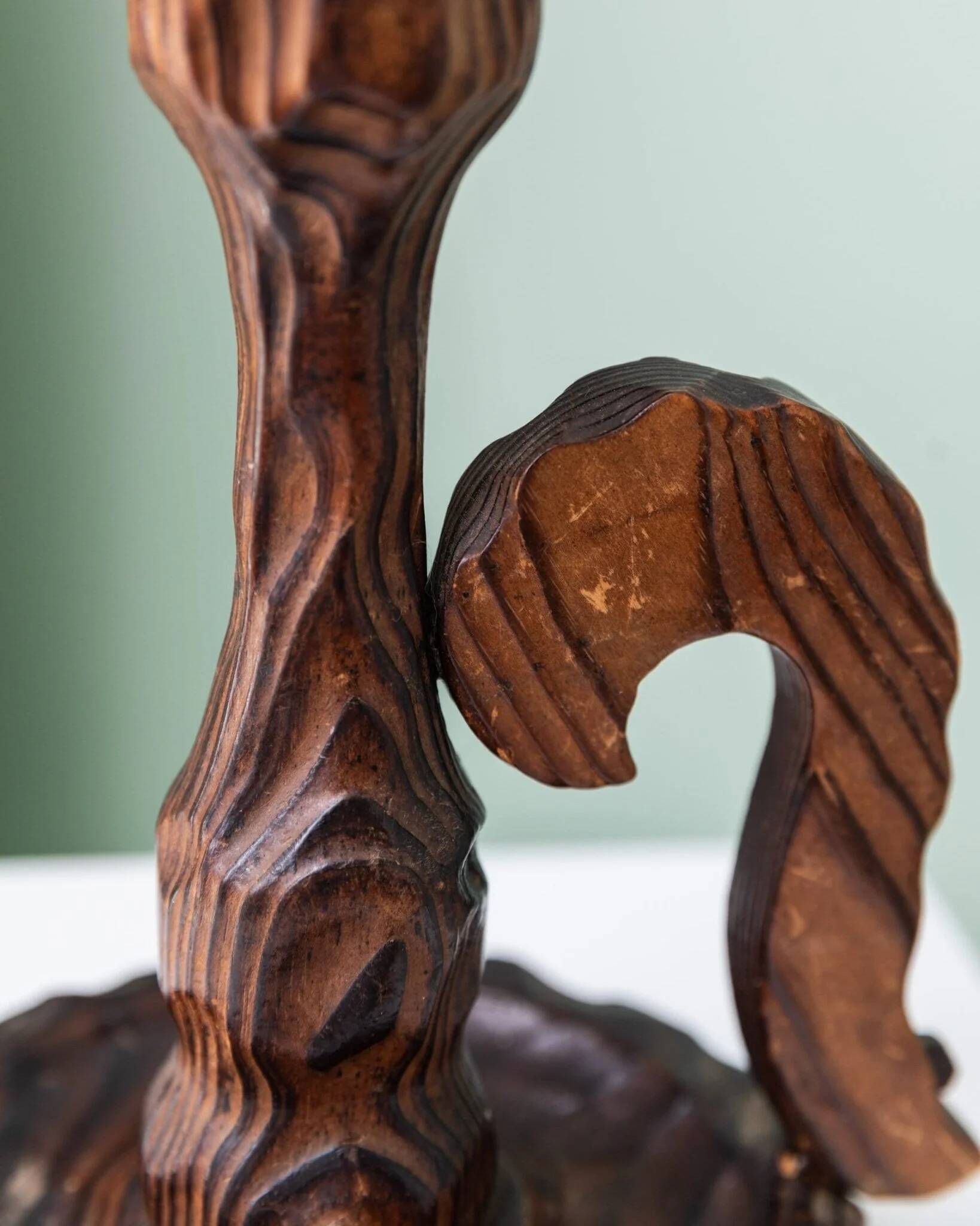 Brutalist carved wood candle holder, dark brown with lighter highlights, made in Italy, 1940s