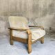 Fauteuil vintage en bois et laine