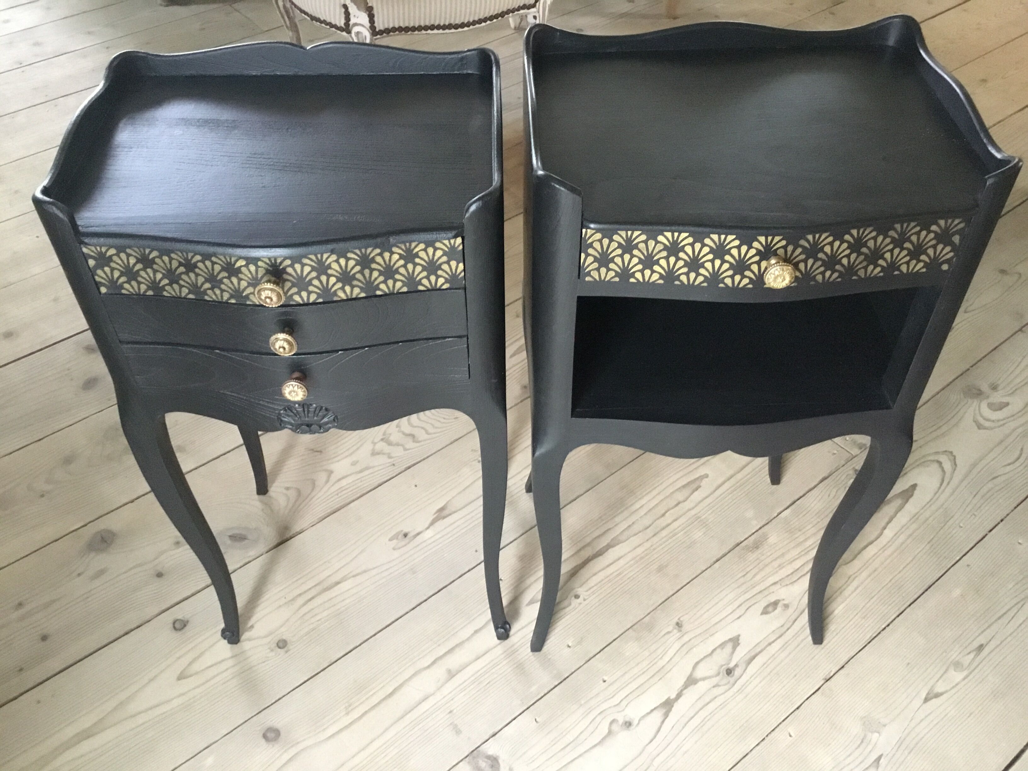 Bedside or nightstand painted black with patterns