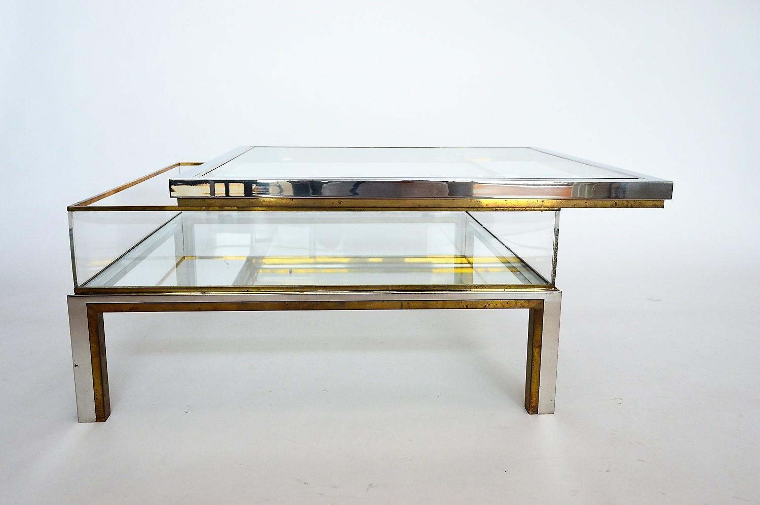Coffee table in brass and chrome with folding top compartment to House Jansen 1970 s