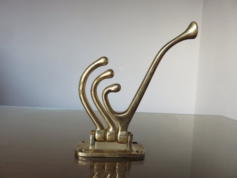 Coatrack swivel brass 70s