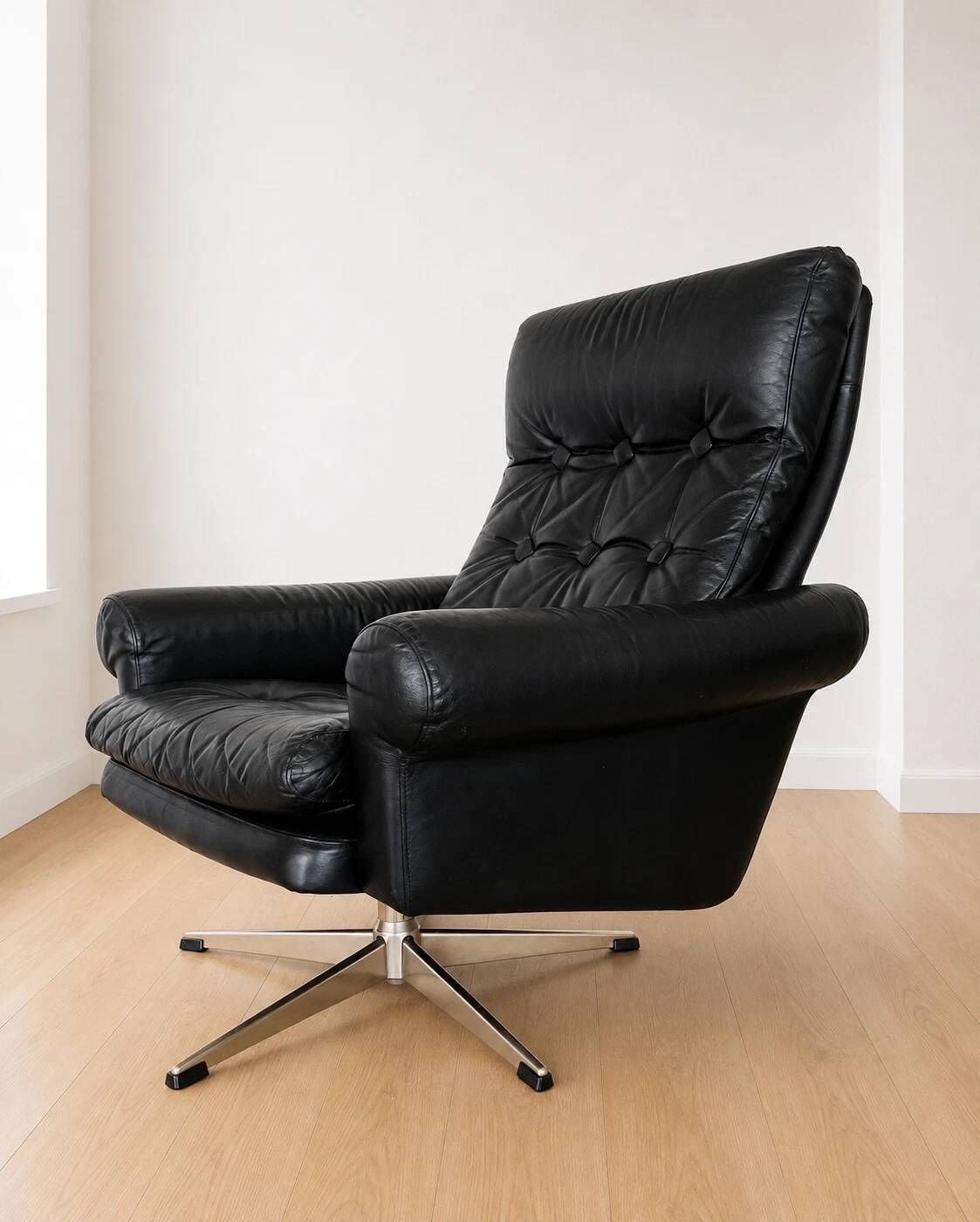 Vintage Danish mid-century black leather swivel chair 1970s
