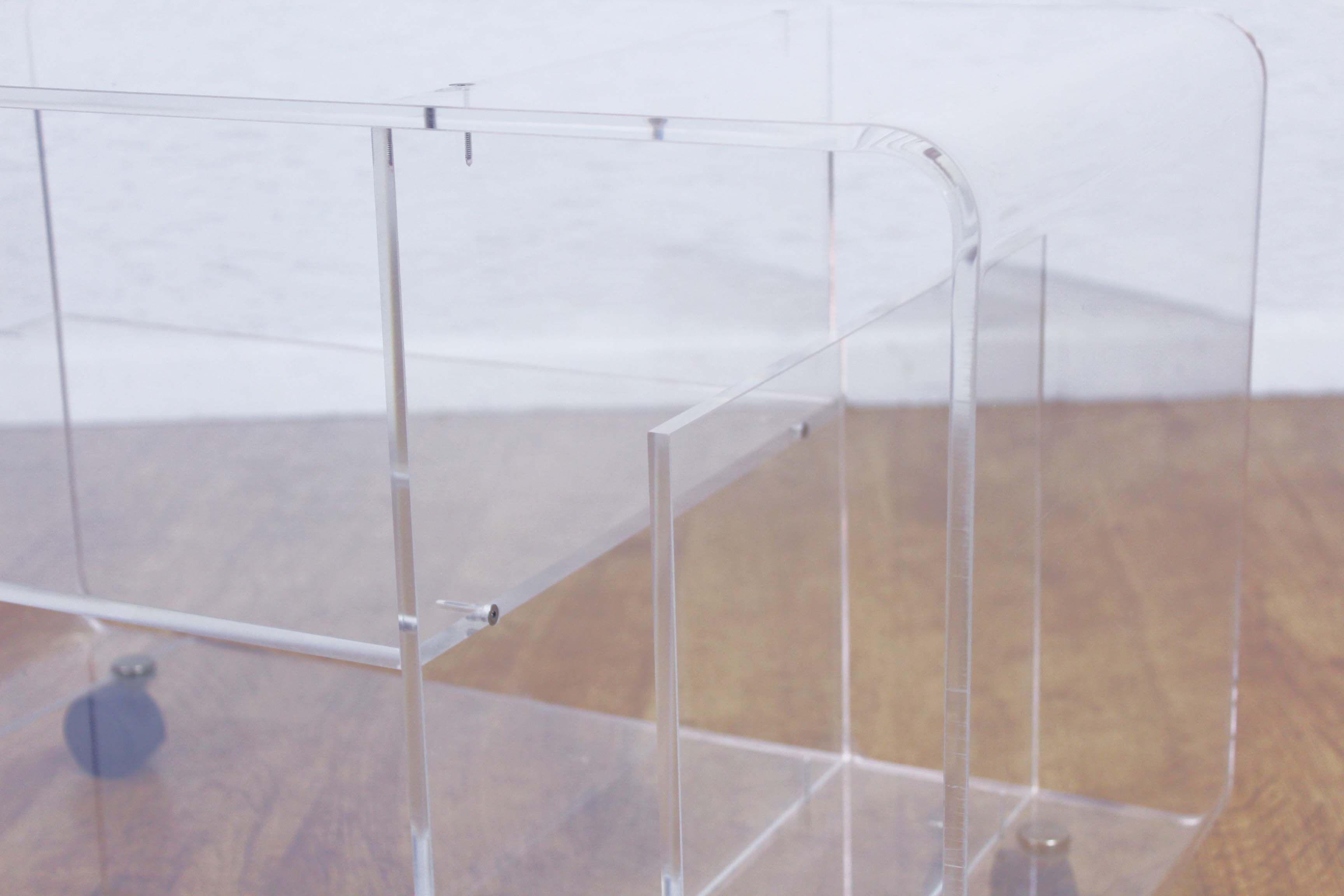 Plexiglas coffee table with vinyl compartment and magazines rack