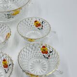 Vintage glass fruit salad serving set with a pansy design.