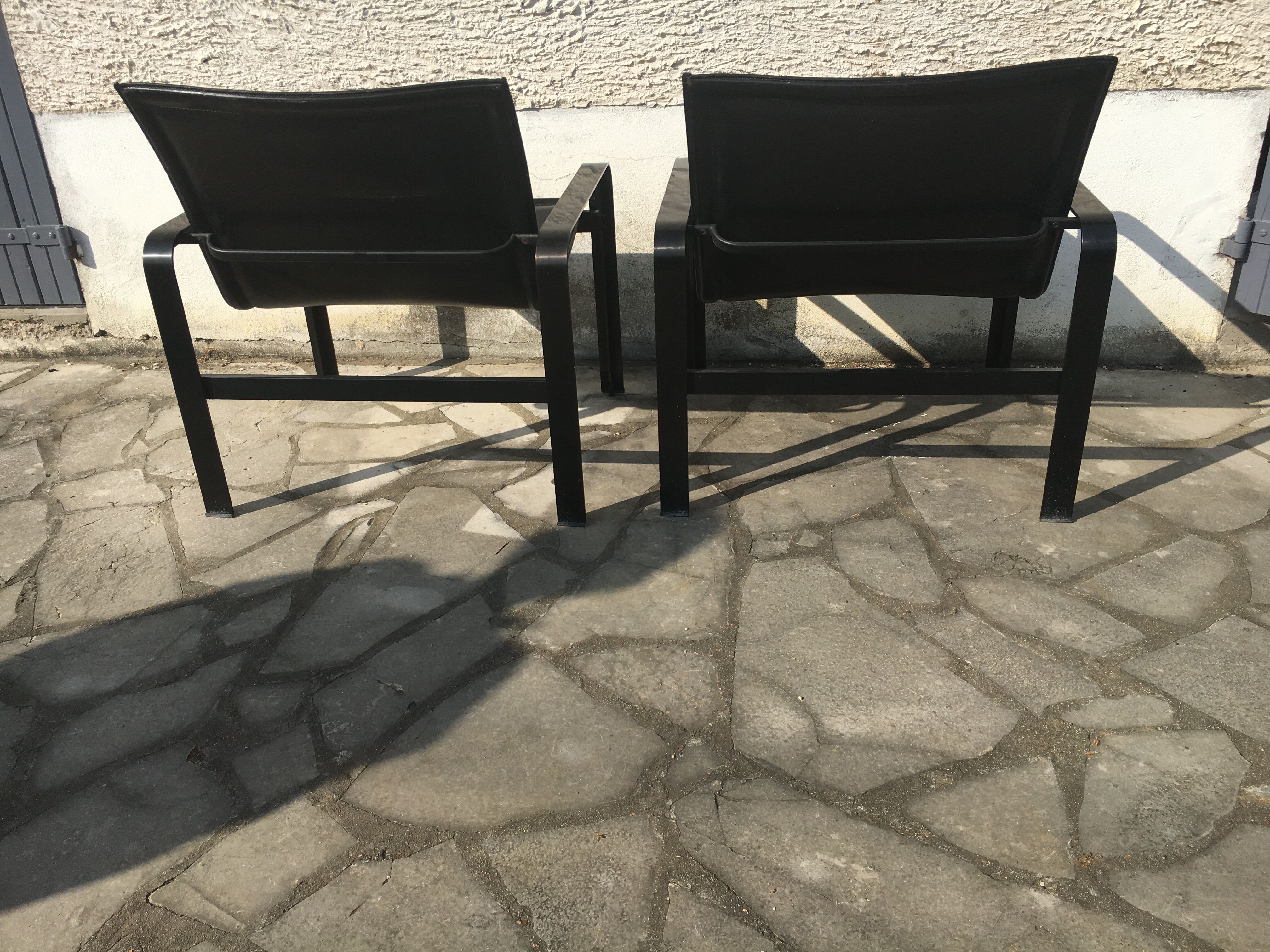 Pair of leather and metal chairs 70s
