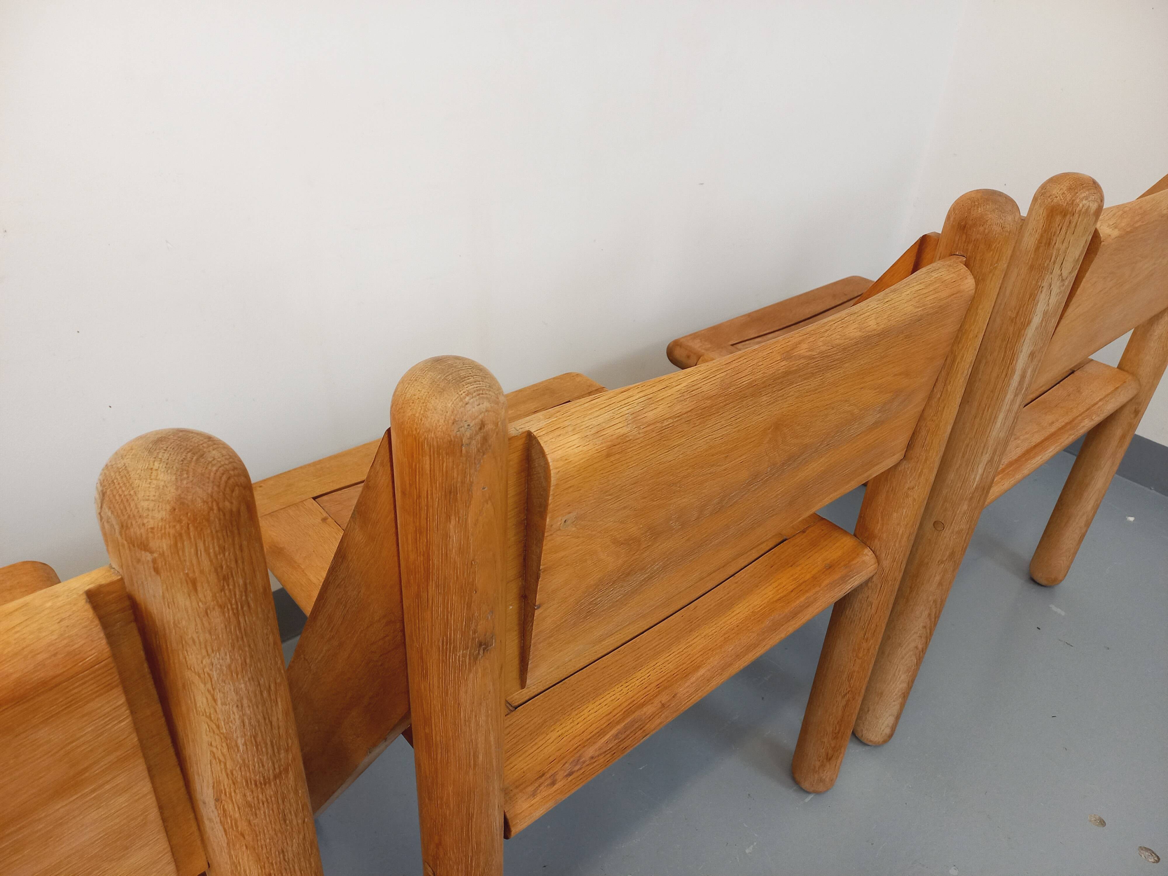 Set of 4 vintage brutalist chairs in solid oak from the 1960s.