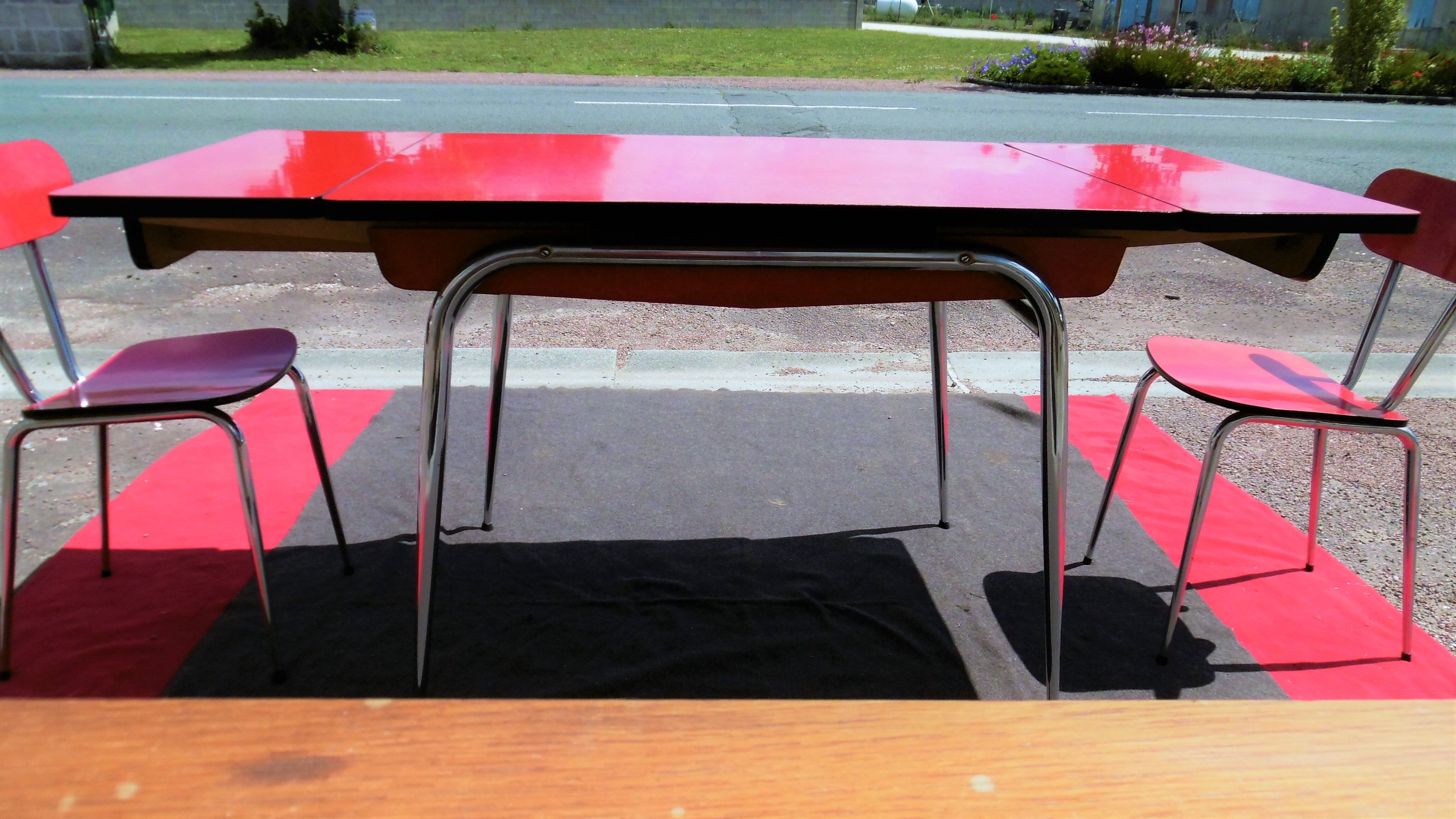 Red formica table and two chairs