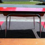Red formica table and two chairs