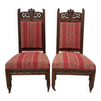 Pair of Gothic-style walnut lounge chairs, 19th century