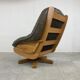 Brutalist oak and leather swivel chair, 1970s