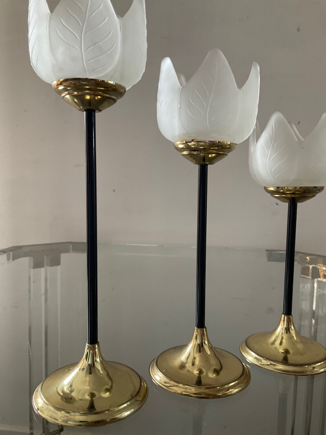 Trio of glass and metal candle holders