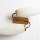 Double flute and brass wall light