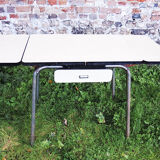 Old extendable table in yellow formica